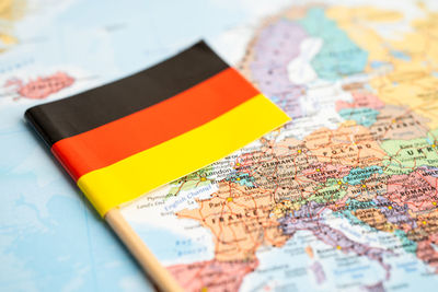 Close-up of german flag on map