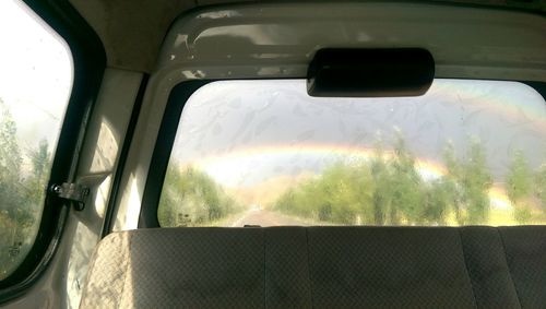 Road seen through car windshield