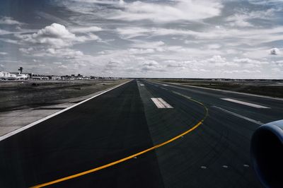 View of airport runway against sky