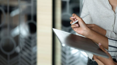 Close-up of person holding hands