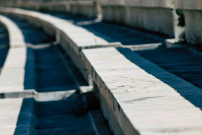 Close-up of railing on footpath