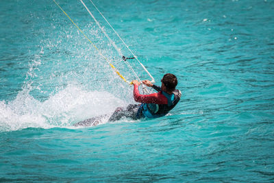 Man surfing in sea