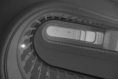 Low angle view of spiral staircase in building