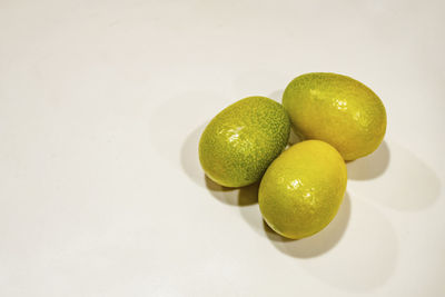 Close up kumquat fruits on white background