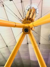 Low angle view of yellow ceiling