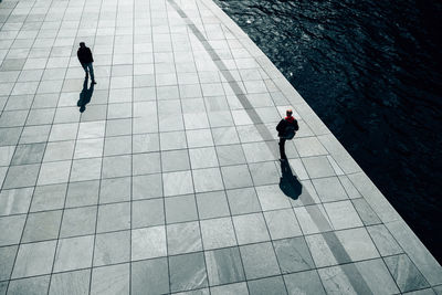 High angle view of men on floor