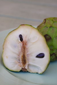 High angle view of fruit in plate on table