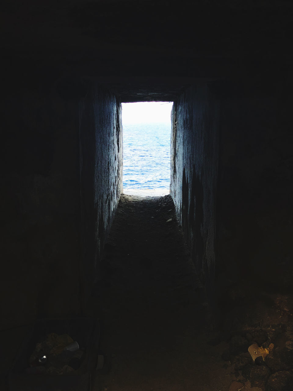 SCENIC VIEW OF SEA SEEN THROUGH ARCHWAY