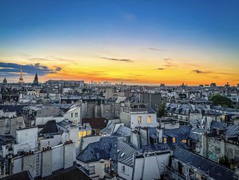High angle view of townscape against sky during sunset