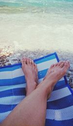 Low section of woman in swimming pool