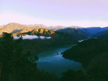 Scenic view of mountains against sky during sunset