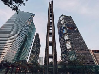 Low angle view of modern buildings against sky