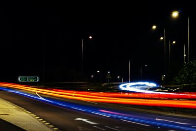 Light trails on road at night