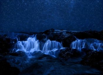 Low angle view of waterfall