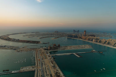 High angle view of bridge over river against sky during sunset