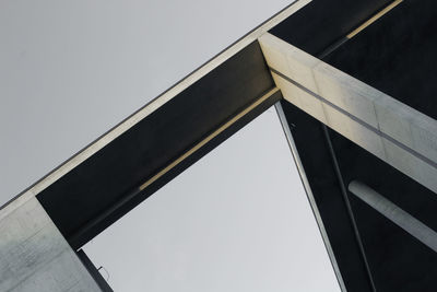 Low angle view of modern office building against sky