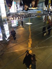 Blurred motion of woman in city