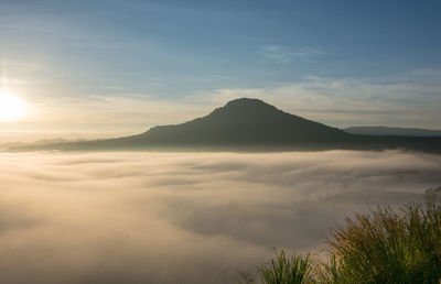 Scenic view of silhouette mountain against sky during sunset