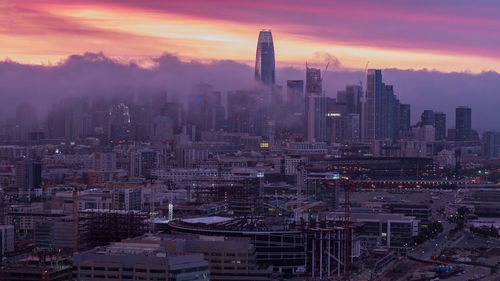 Cityscape against sky during sunset