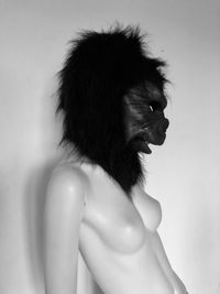 Rear view of woman against white background