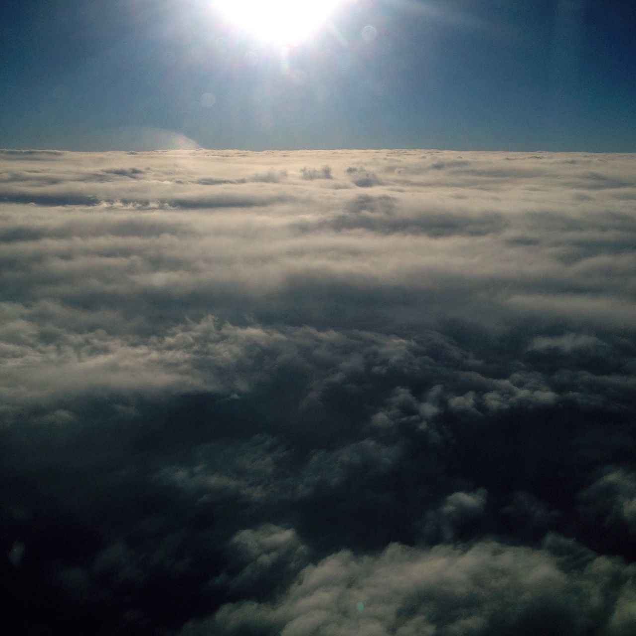 nature, beauty in nature, scenics, tranquil scene, sunlight, sky, aerial view, cloudscape, tranquility, outdoors, landscape, sun, sunbeam, no people, the natural world, day