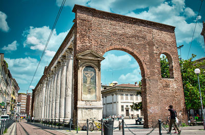 View of old building against cloudy sky