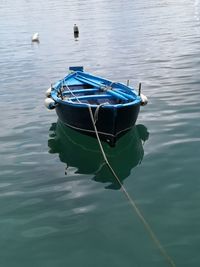 High angle view of boat moored in lake