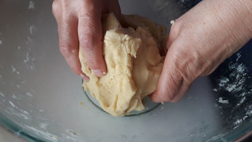 Midsection of person holding ice cream