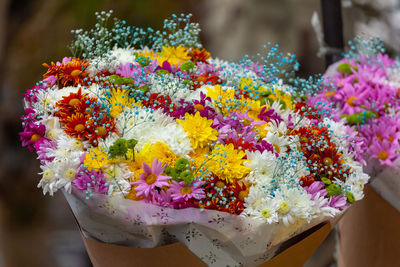 Close-up of multi colored flowering plants in market