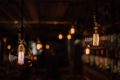 Close-up of illuminated light bulb