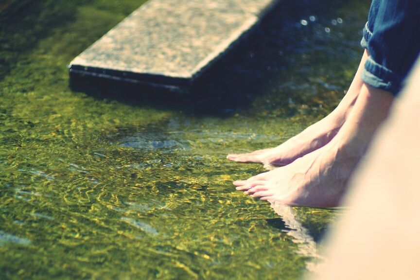 low section, person, part of, cropped, grass, shoe, lifestyles, human foot, unrecognizable person, leisure activity, personal perspective, close-up, holding, selective focus, day, men