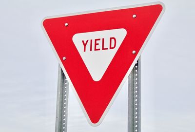 Close-up of stop sign on metal