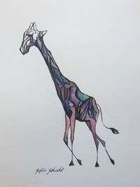Close-up of animal representation against white background