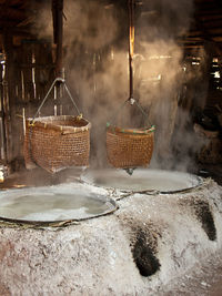 Baskets hanging at salt factory