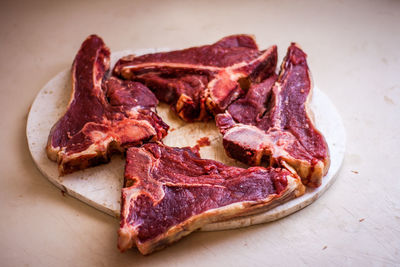 Close-up of meat on cutting board