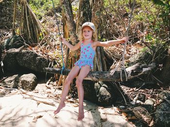 Full length portrait of girl in sunlight
