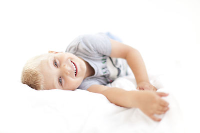 Studio shot of smiling boy