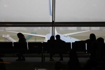 Silhouette people at airport