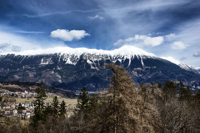 Scenic view of snowcapped mountains against sky