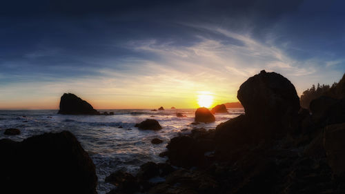 Scenic view of sea against sky during sunset