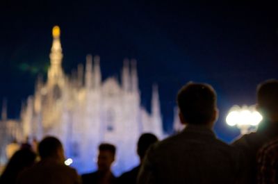 Silhouette of people at night