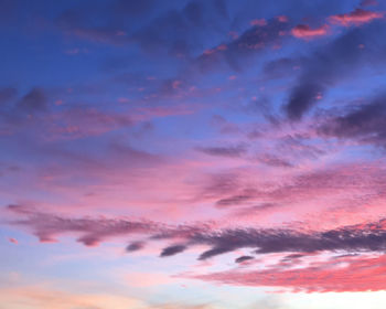 Low angle view of dramatic sky during sunset