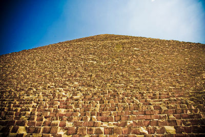 Low angle view of old ruins against sky