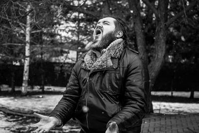 Man screaming outdoors