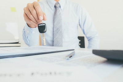 Midsection of man on table