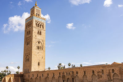 Low angle view of clock tower against sky