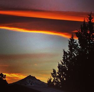 Scenic view of mountains at sunset