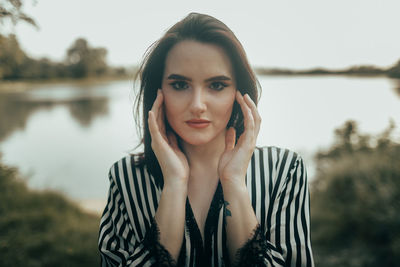 Portrait of young woman looking away