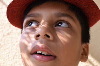 Close-up portrait of boy looking away