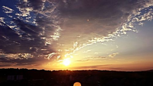 Scenic view of sunset over landscape